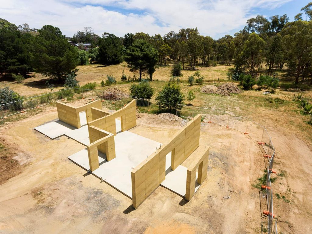 rammed earth construction on solar passive family home