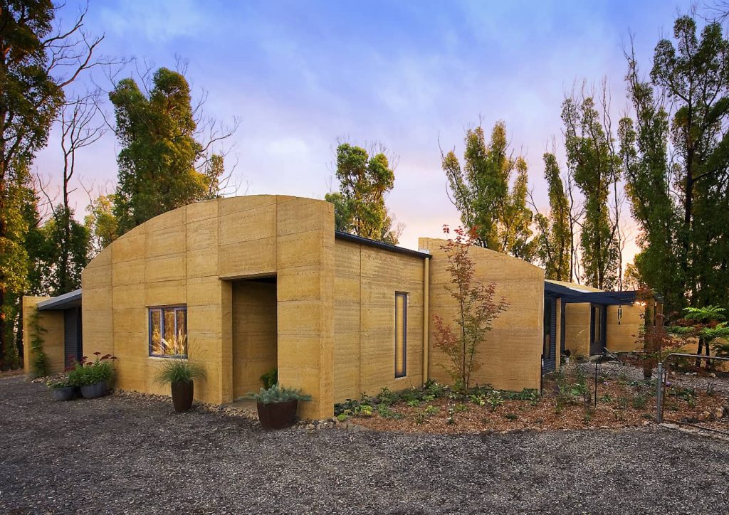 Unique curved rammed earth walls